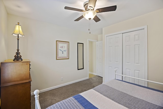 bedroom featuring a closet, ceiling fan, and dark colored carpet