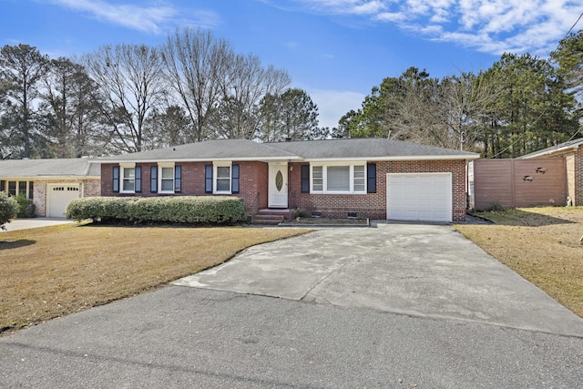 single story home with a garage and a front lawn