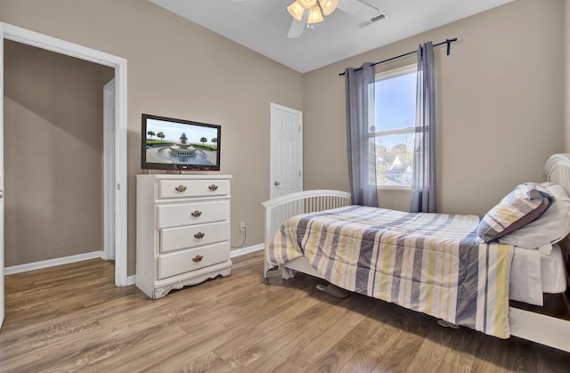 bedroom featuring ceiling fan and light wood-type flooring