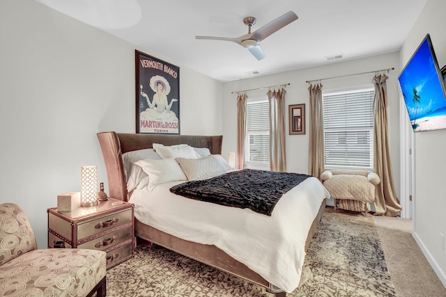 carpeted bedroom featuring ceiling fan