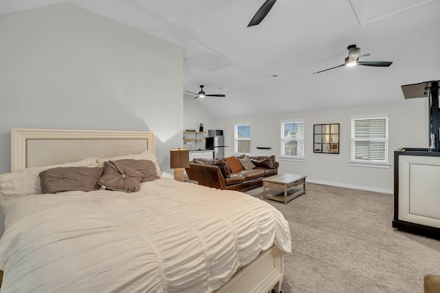 carpeted bedroom featuring ceiling fan and vaulted ceiling