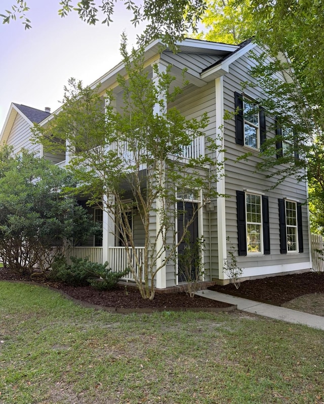 1418 Whispering Oak Trl, Mount Pleasant, SC 29466 - view of home's exterior with a lawn and covered porch