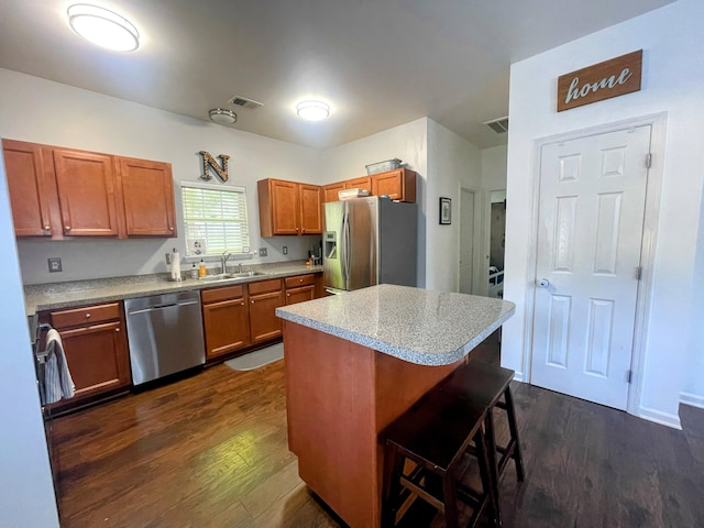 1418 Whispering Oak Trl, Mount Pleasant, SC 29466 - kitchen with appliances with stainless steel finishes, dark wood-type flooring, a sink, and light countertops