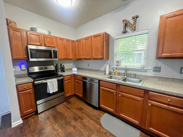 1418 Whispering Oak Trl, Mount Pleasant, SC 29466 - kitchen with appliances with stainless steel finishes, a sink, light countertops, and brown cabinets