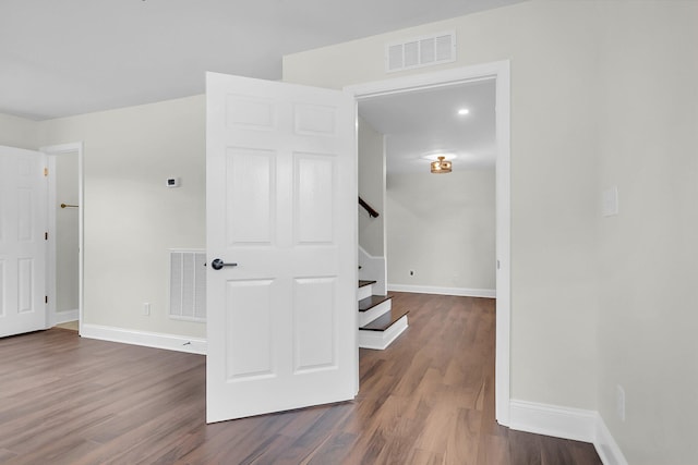 interior space featuring dark wood-type flooring