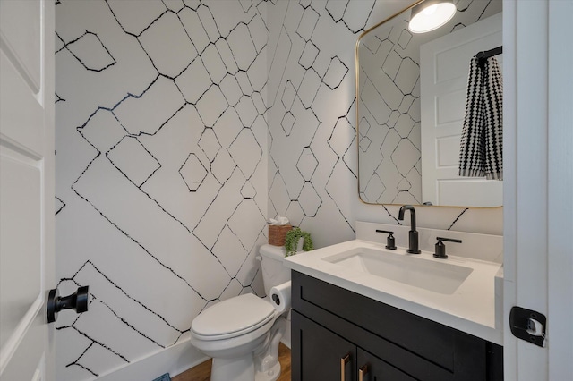 full bath featuring toilet, curtained shower, and vanity