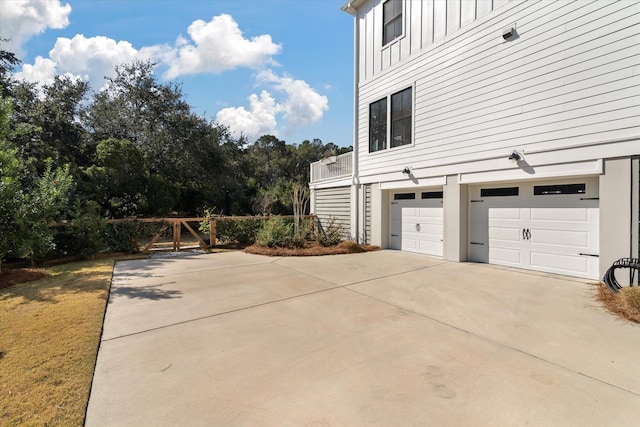 view of property exterior featuring driveway