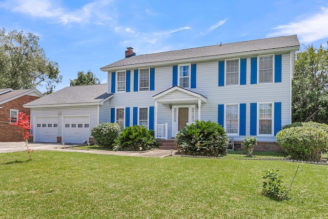 colonial-style house with a garage and a front lawn