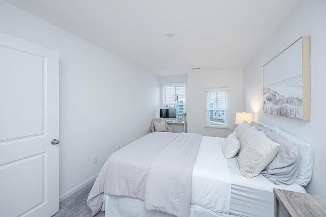 bedroom featuring carpet flooring