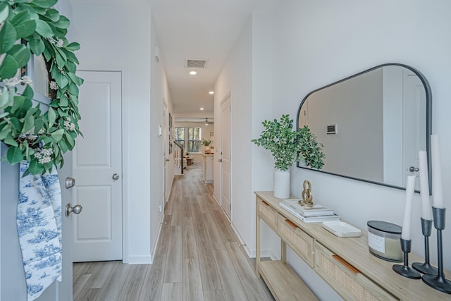 hallway featuring light wood-type flooring