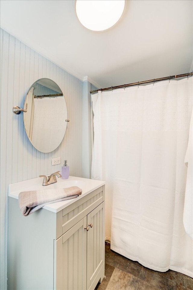 bathroom featuring tile floors and oversized vanity