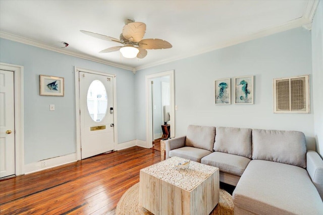 living room with ceiling fan, dark hardwood / wood-style floors, and crown molding