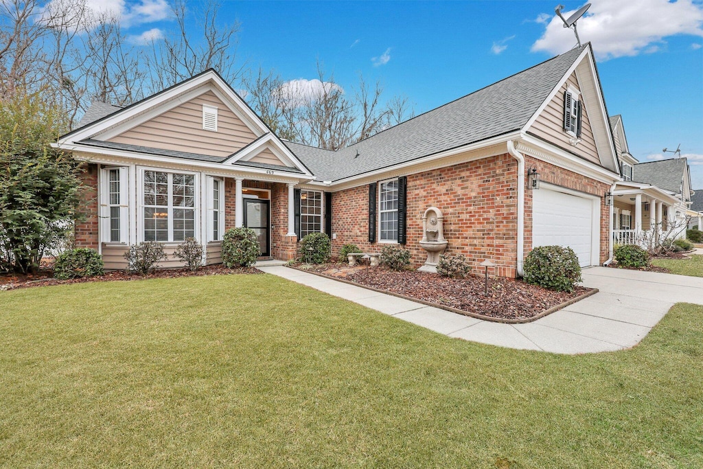 view of front of property with a front lawn