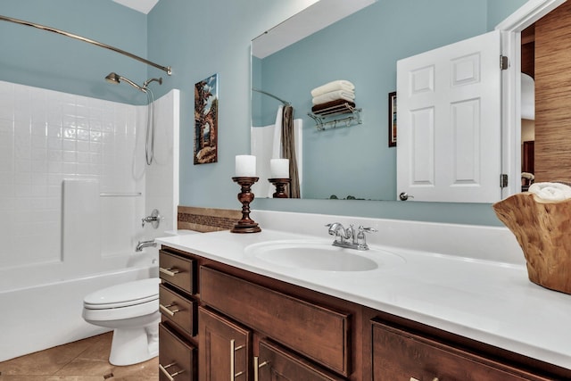 full bathroom featuring vanity, toilet, tile patterned floors, and shower / bath combo