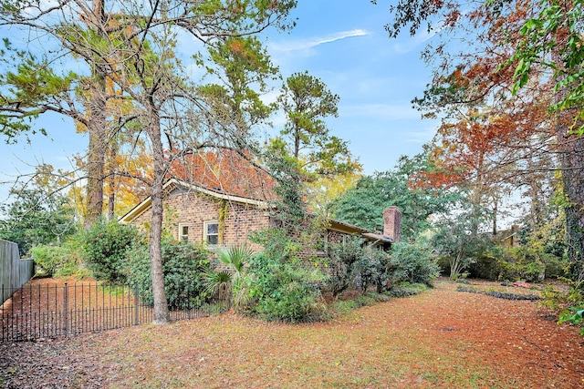 view of yard featuring fence