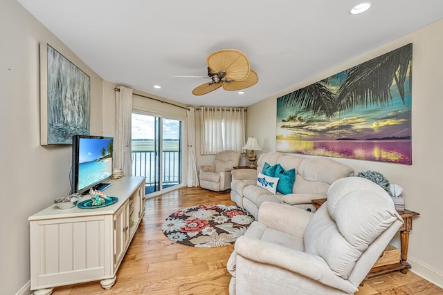 3701 Docksite Rd Unit 220, Edisto Island, SC 29438 - living room with light wood-style floors, ceiling fan, recessed lighting, and baseboards