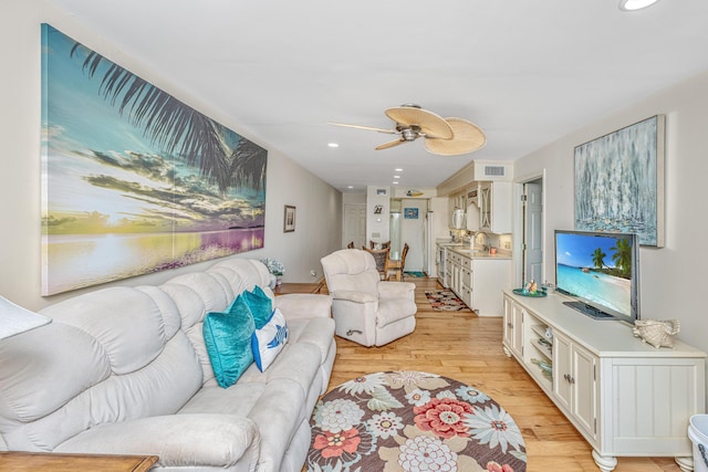 3701 Docksite Rd Unit 220, Edisto Island, SC 29438 - living area featuring light wood-style flooring, ceiling fan, and recessed lighting