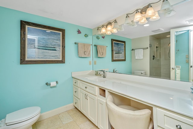 3701 Docksite Rd Unit 220, Edisto Island, SC 29438 - bathroom featuring toilet, baseboards, a shower stall, and vanity