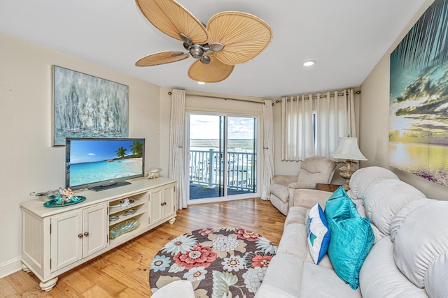 3701 Docksite Rd Unit 220, Edisto Island, SC 29438 - living room with light wood-style flooring, recessed lighting, ceiling fan, and baseboards