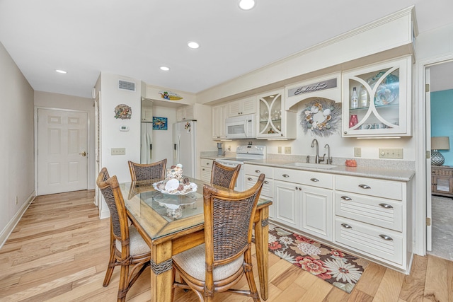 3701 Docksite Rd Unit 220, Edisto Island, SC 29438 - dining space with light wood-type flooring, recessed lighting, and baseboards