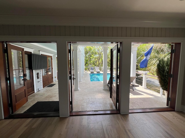 doorway to outside featuring light wood-type flooring