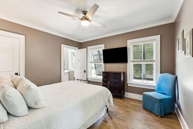 bedroom with ceiling fan, light wood-type flooring, and ornamental molding