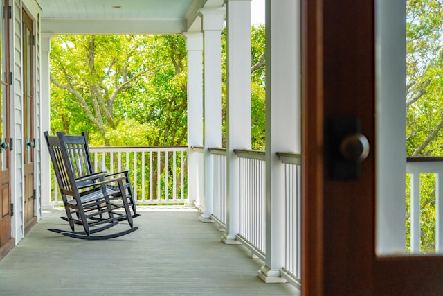 balcony featuring a porch