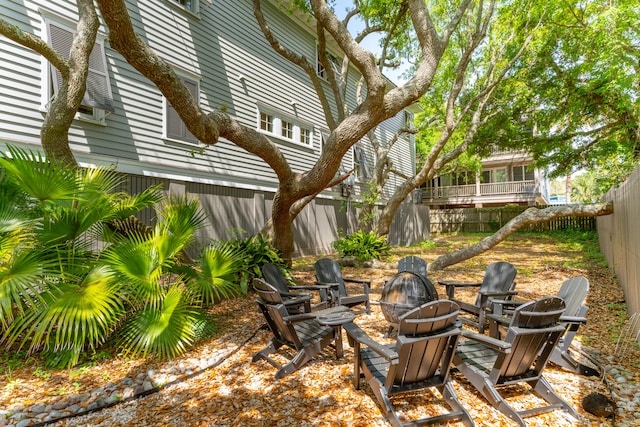 view of terrace featuring an outdoor fire pit