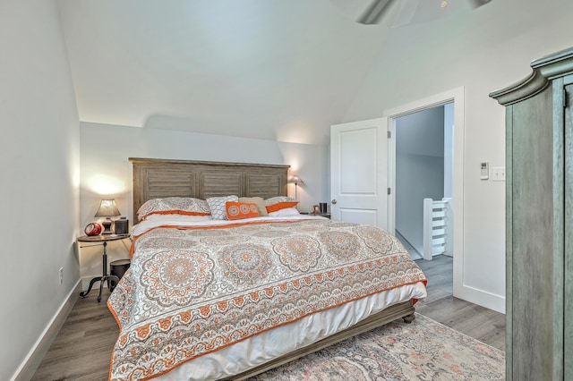 169 Jackson St, Charleston, SC 29403 - bedroom with baseboards, wood finished floors, and vaulted ceiling