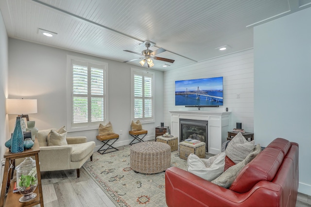 169 Jackson St, Charleston, SC 29403 - living room with ceiling fan, a glass covered fireplace, recessed lighting, baseboards, and wood finished floors