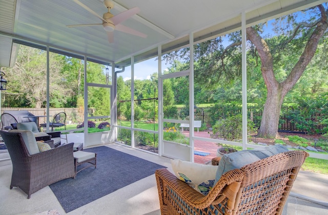 5406 E Crosland Ct, North Charleston, SC 29420 - sunroom with ceiling fan and view of scattered trees