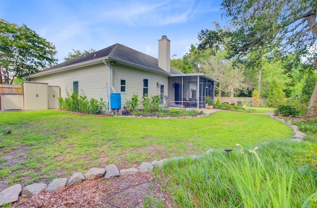 5406 E Crosland Ct, North Charleston, SC 29420 - rear view of property featuring a sunroom and a chimney
