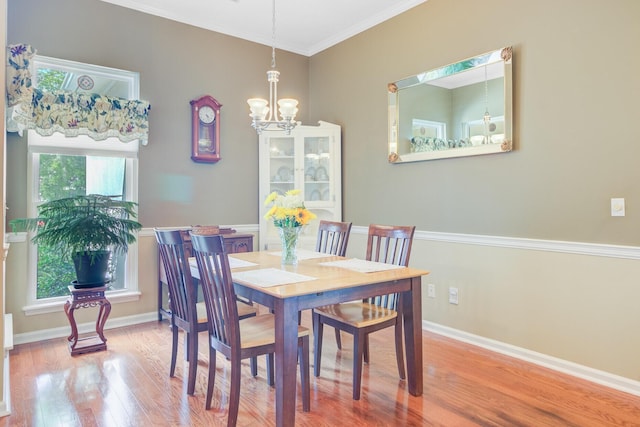 5406 E Crosland Ct, North Charleston, SC 29420 - dining space featuring wood finished floors, a chandelier, and ornamental molding