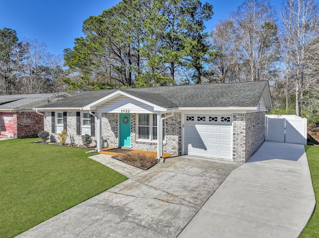 single story home with a garage and a front yard