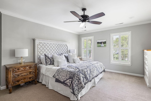 bedroom featuring crown molding, carpet, a ceiling fan, baseboards, and visible vents