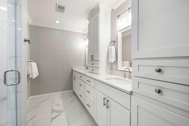 bathroom featuring visible vents, a sink, baseboards, and ornamental molding