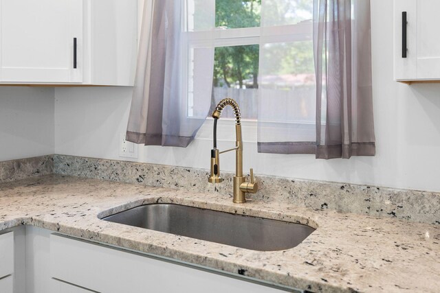 8767 Auburn Dr, North Charleston, SC 29406 - kitchen view of white cabinetry and light stone countertops
