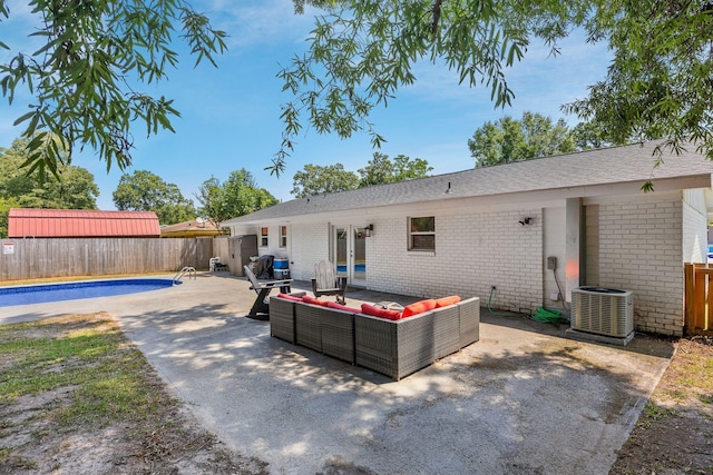 8767 Auburn Dr, North Charleston, SC 29406 - rear view of house featuring an outdoor hangout area, a fenced backyard, brick siding, and a patio area