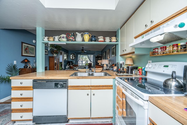 kitchen featuring ceiling fan, white cabinetry, white appliances, and sink