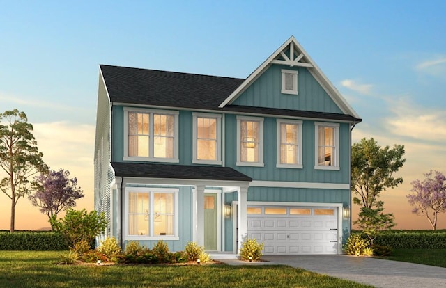1219 Homecoming Blvd Unit Cc1-27, Ravenel, SC 29470 - view of front facade with an attached garage, driveway, a front yard, and roof with shingles