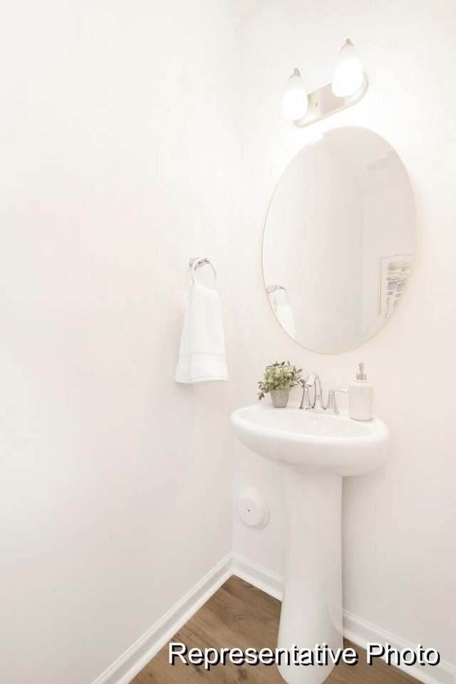 1219 Homecoming Blvd Unit Cc1-27, Ravenel, SC 29470 - bathroom featuring wood finished floors and baseboards