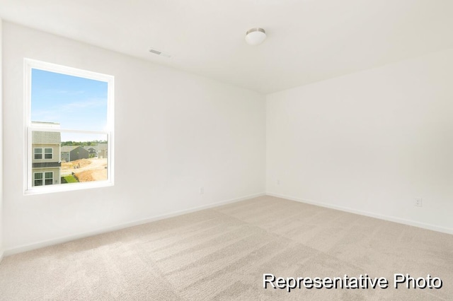 1219 Homecoming Blvd Unit Cc1-27, Ravenel, SC 29470 - unfurnished room with light colored carpet