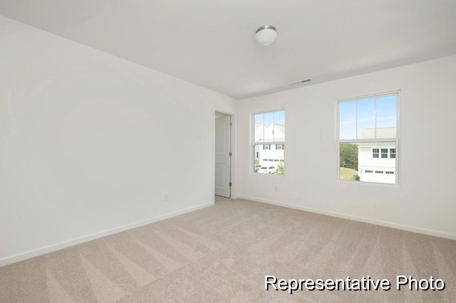 1219 Homecoming Blvd Unit Cc1-27, Ravenel, SC 29470 - unfurnished room featuring baseboards and carpet floors