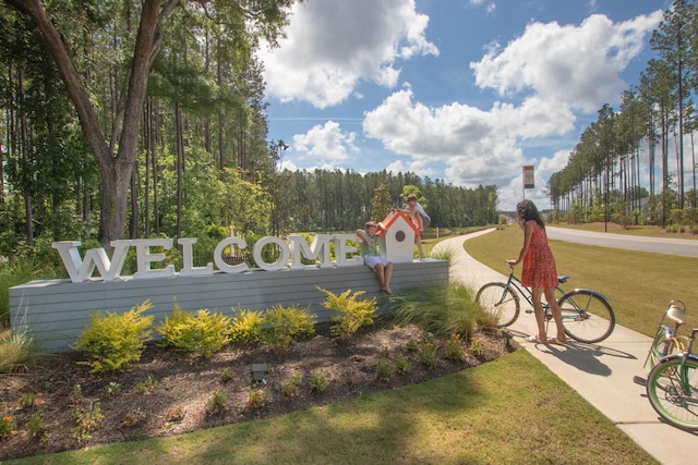 1219 Homecoming Blvd Unit Cc1-27, Ravenel, SC 29470 - community / neighborhood sign featuring a lawn