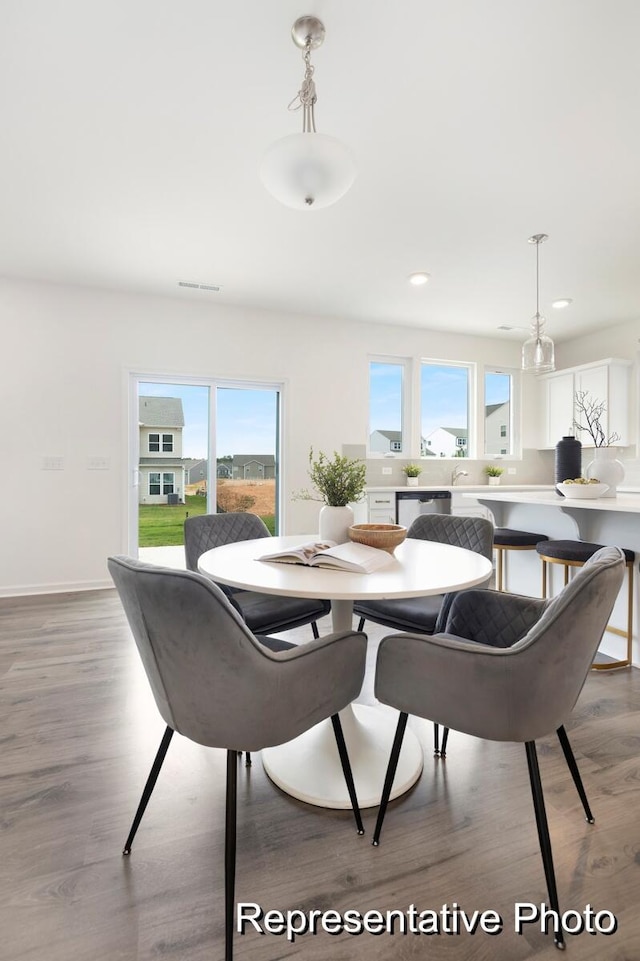 1219 Homecoming Blvd Unit Cc1-27, Ravenel, SC 29470 - dining area featuring light wood-style floors and recessed lighting