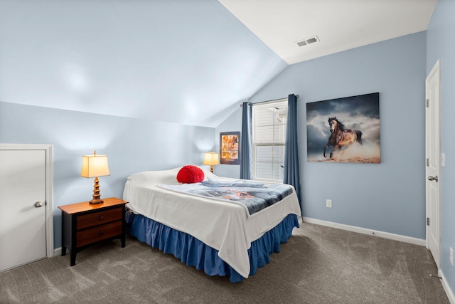 bedroom with vaulted ceiling, carpet floors, visible vents, and baseboards