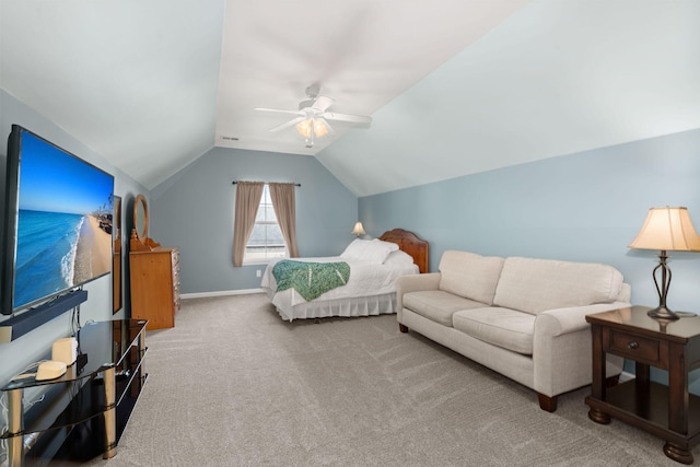 bedroom featuring vaulted ceiling, carpet floors, ceiling fan, and baseboards