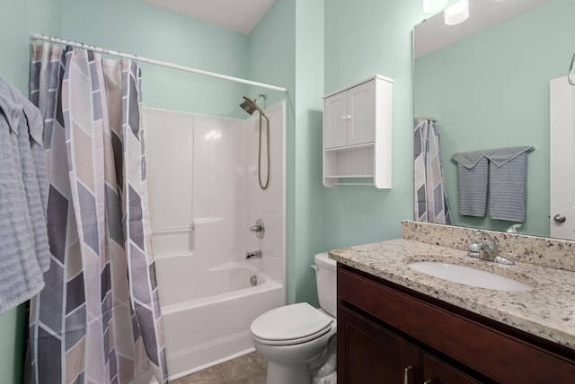 bathroom with shower / bathtub combination with curtain, vanity, toilet, and tile patterned floors