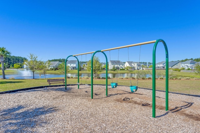 communal playground featuring a water view