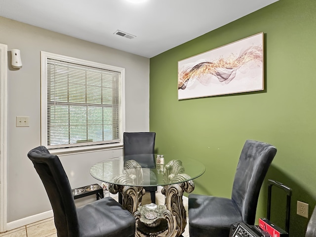 view of tiled dining space